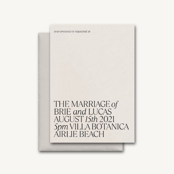     Minimalist printed wedding invitation suite featuring modern black typography on textured ivory paper.